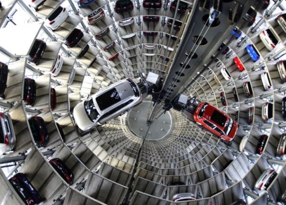 WOLFSBURG, GERMANY - MARCH 10: A brand new Volkswagen Passat and Golf 7 car stands stored in a tower at the Volkswagen Autostadt complex near the Volkswagen factory on March 10, 2015 in Wolfsburg, Germany. Volkswagen is Germany's biggest car maker and is scheduled to announce financial results for 2014 later this week. Customers who buy a new Volkswagen in Germany have the option of coming to the Autostadt customer service center in person to pick up their new car. (Photo by Alexander Koerner/Getty Images)